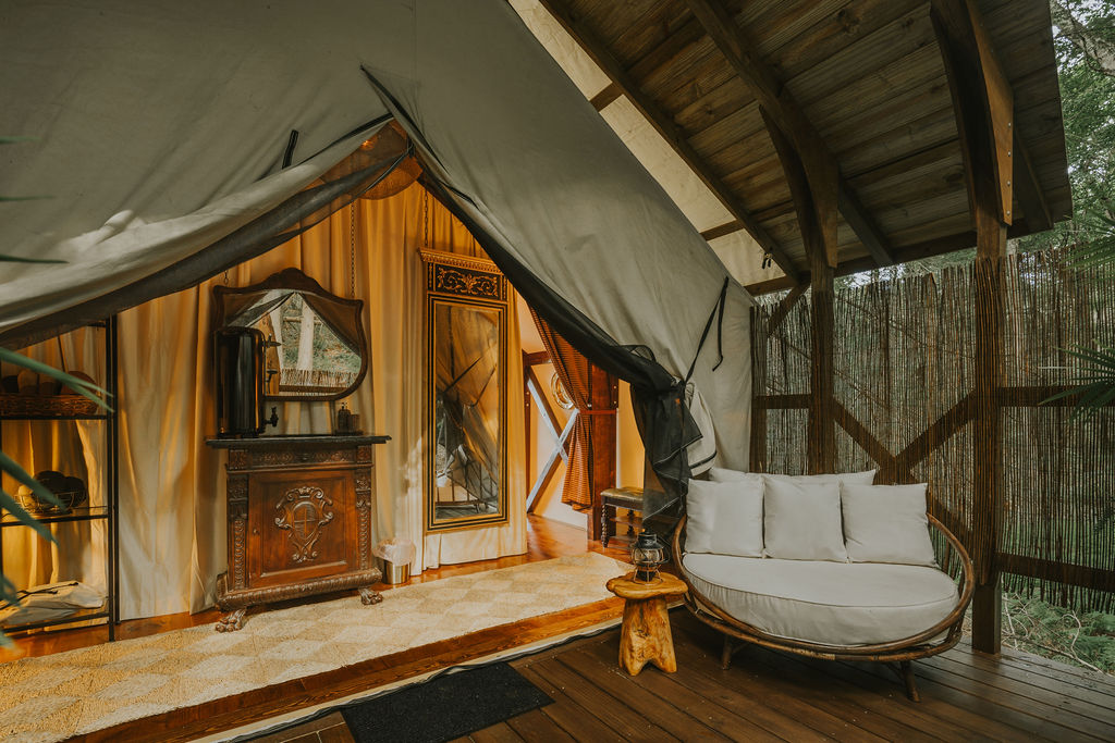 Seating area inside South Camp with hand-crafted timber framing