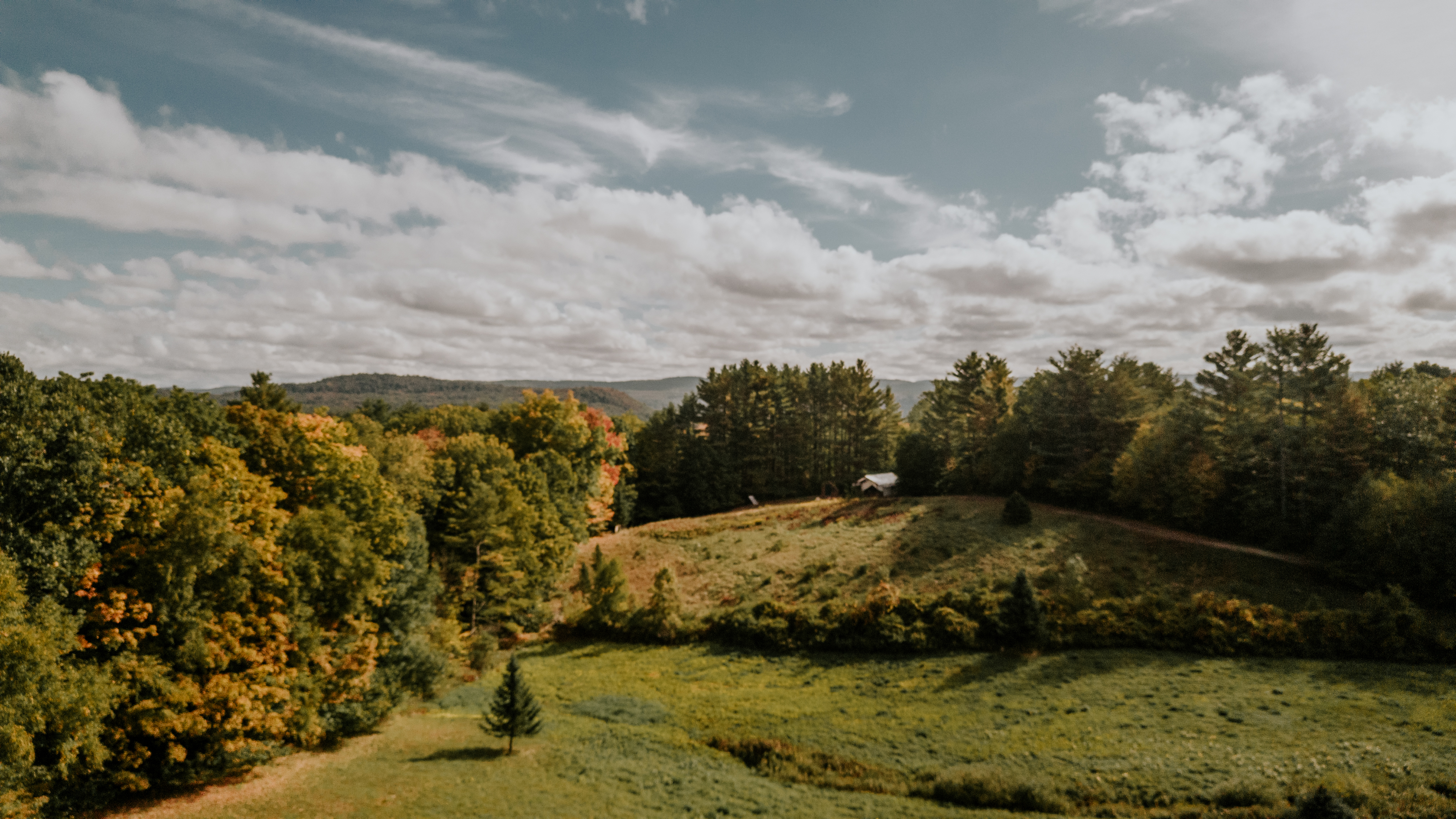 Aerial view of Highwood Retreat in winter snow